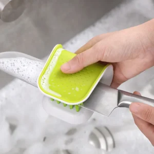 Remove the silverware and scrub with a soft-bristled brush