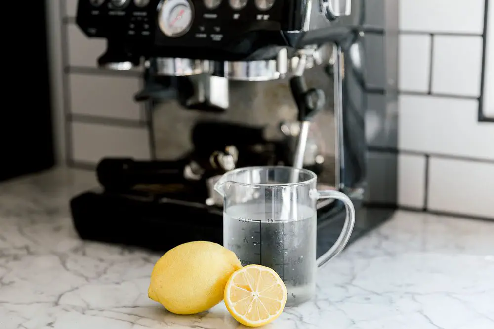 Boiling Water and Lemon Juice Soak to clean coffee grinder